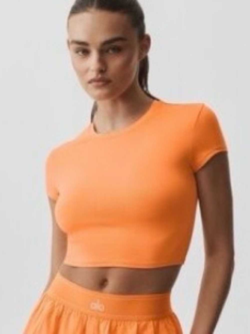 ALO Yoga AloSoft Crop Finesse Short Sleeve Tee in Satsuma Breeze Orange - NWT
